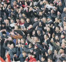  ?? ?? Sunderland fans celebrate the victory.