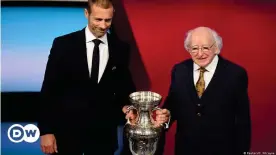  ??  ?? UEFA President Aleksander Ceferin with the European Championsh­ip trophy along with Irish President Michael D. Higgins, whose country could lose co-hosting rights.