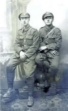  ?? PHOTO COURTESY CAPT. (RETIRED) ROGER POWLEY ?? Gordon Powley, left, and brother Fred of Niagara Falls are pictured in their First World War uniforms. Fred was killed in the Battle of Vimy Ridge. Gordon survived and was awarded the Military Medal for Bravery.