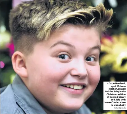  ?? Richard Swingler ?? > Oscar Hartland, aged 10, from Machen, played Neil the Baby in the Christmas edition of Gavin & Stacey and, left, with James Corden when he was a baby