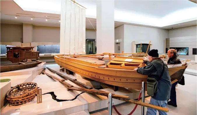  ?? Photos by Taku Yaginuma/Special to The Yomiuri Shimbun ?? A half-size replica of a Kasai boat, which played a key role in the human waste business, is displayed at the Katsushika City Museum in Katsushika Ward, Tokyo.