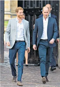  ??  ?? Prince Harry chats to a young fan, left, near Windsor Castle yesterday during a walkabout with the Duke of Cambridge, above and top, as Meghan Markle, right, arrived for a night at Cliveden House Hotel ahead of the wedding