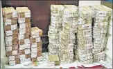  ?? ?? Hundreds of crores of cash was recovered during a series of raids by tax officials at properties connected to Jain.