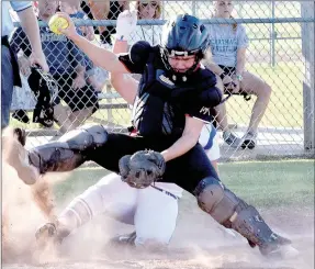 ?? RICK PECK/MCDONALD COUNTY PRESS ?? McDonald County catcher Kylie Helm gets taken out at the plate after recording a force out during the Lady Mustangs’ 5-4 loss on Aug. 28 at Carthage.