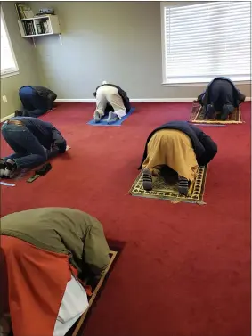  ?? BILL RETTEW — MEDIANEWS GROUP ?? Bowing to Mecca while praying to God.