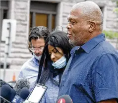  ?? JIM MONE/AP ?? George Floyd’s uncle, Selwyn Jones, and his aunt, Angela Harrelson, address the media Monday after a court appearance in Minneapoli­s for four former Minneapoli­s police officers facing charges ranging from second-degree murder to aiding and abetting murder in their nephew’s death.