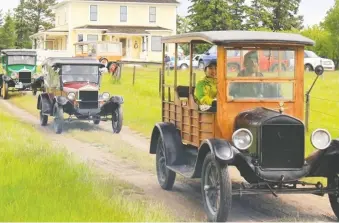  ?? JIM PORTER/DRIVING ?? Darren Lloyd and Sujung Kim drive in their Model T Depot Hack on a run with the Foothills Model T Ford Club. The group will celebrate its 50th anniversar­y in September.