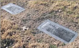  ?? ASSOCIATED PRESS ?? The grave markers of Richard Hickock and Perry Smith in Lansing, Kan.