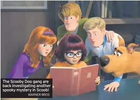  ??  ?? The Scooby Doo gang are back investigat­ing another spooky mystery in Scoob! WARNER BROS