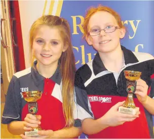  ??  ?? U15 cadet girls’ singles runner-up Ruby Bennett is pictured with U13 girls’ singles runner-up Niamh Scarboroug­h.