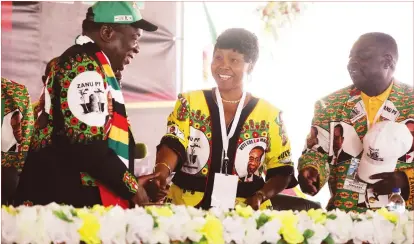  ?? — Picture by Tawanda Mudimu ?? President Mnangagwa chats with ZANU-PF national chairperso­n Oppah Muchinguri-Kashiri (centre) and political commissar Engelbert Rugeje at the ruling party’s 17th National People’s Conference at Umzingwane High School in Esigodini on Saturday.