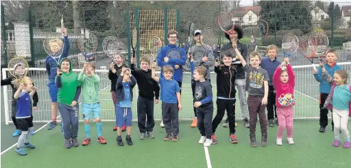  ??  ?? Children get coaching at South Park on Saturday morning