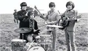  ??  ?? The Beatles on Salisbury Plain in 1965 during the filming of Help