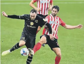  ??  ?? Will Grigg in action for Sunderland against MK Dons.