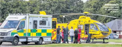  ??  ?? EMERGENCY Paramedics and air ambulance at scene