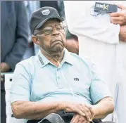  ?? UPI ?? HEAT OF THE SON: During a ceremony honoring Lee elder as the first black man to play the Masters, Wayne Player, the son of golf icon Gary Player, used the opportunit­y to promote his father’s golf balls.