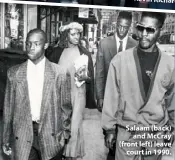  ??  ?? Salaam (back) and McCray (front left) leave court in 1990.