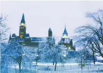  ?? MALAK KARSH ?? Parliament Hill captured during the 1998 ice storm.