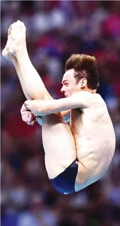  ??  ?? Great Britain’s Tom Daley competes in the Men’s 10m plaform final during the diving competitio­n at the 2017 FINA World Championsh­ips in Budapest, on July 22, 2017. - AFP photo