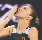  ?? — AFP ?? Romania’s Simona Halep celebrates her 6-2, 6-3 win over Venus Williams of the US.