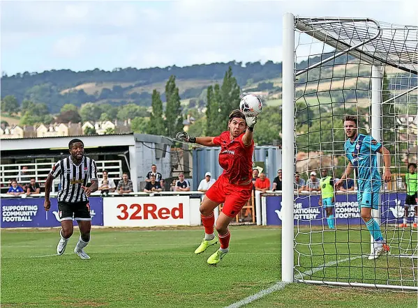  ?? ?? Bath City’s Scott Wilson watching Alex Fletcher’s header go past Braintree keeper Jack Sims in the 3-1 win