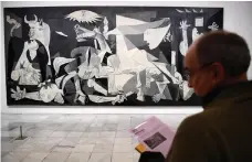  ?? AFP ?? In a Paris attic, Picasso painted Guernica, a haunting work of art that soon became a universal howl against war