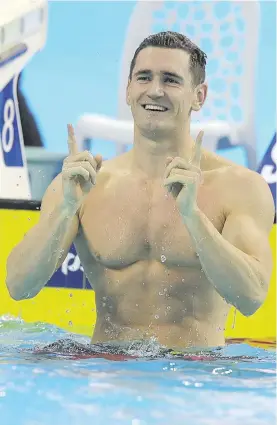  ?? Picture: Getty Images ?? THE MAIN MAN. South Africa’s Cameron van der Burgh celebrates after winning the men’s 100m breaststro­ke World Swimming Championsh­ips in Hangzhou yesterday.