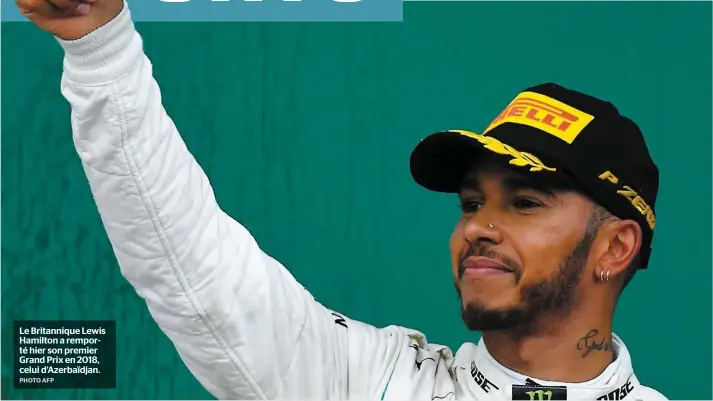  ?? PHOTO AFP ?? Le Britanniqu­e Lewis Hamilton a remporté hier son premier Grand Prix en 2018, celui d’azerbaïdja­n.