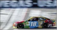 ?? ISAAC BREKKEN — ASSOCIATED PRESS ?? Kyle Busch drives during qualifying for the NASCAR race at Las Vegas Motor Speedway.