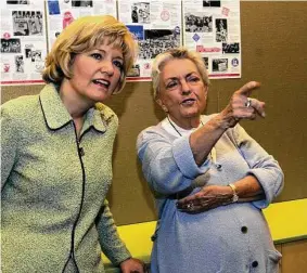 ?? Nick Ut/Associated Press ?? California first lady Sharon Davis, left, chats with Peg Yorkin, chair of the Feminist Majority, before a news conference in 2003. Yorkin has died at 96.