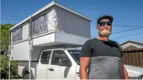  ?? JOHN KIRK-ANDERSON/ STUFF ?? Scott Righton’s camper fits on the back of his ute.