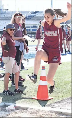  ??  ?? Chattanoog­a Valley Middle School long jumper Colleen Thomas takes off during last week’s dual meet at Ringgold. The Eagles and Lady Eagles both went on to victory. (Photo by Scott Herpst) Gordon Lee 16, Heritage 5