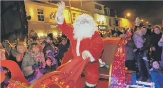  ??  ?? Santa arrives on his sleigh to turn on Seaham’s Christmas lights.