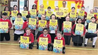  ??  ?? Great Harwood St John’s Primary School pupils are showing their support for a new global health campaign - Defenders of Health