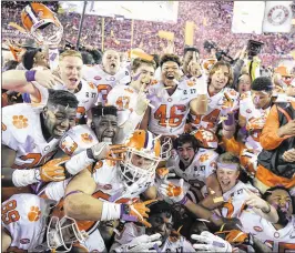  ?? ANDRES LEIVA / TAMPA BAY TIMES ?? Clemson’s 35-31 win over Alabama in the CFP title game was the icing on the cake of the ACC’s growing supremacy over the SEC. Clemson coach Dabo Swinney is 8-4 vs. the SEC since the start of the 2012 season.