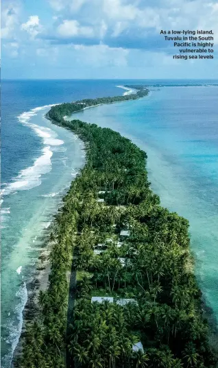  ??  ?? As a low-lying island, Tuvalu in the South Pacific is highly vulnerable to rising sea levels