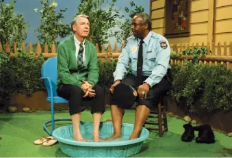  ??  ?? Fred Rogers and François Clemmons in an episode of Mister Rogers’ Neighborho­od, 1993