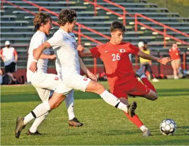  ?? STAFF PHOTO BY MATT HAMILTON ?? Dalton’s Yahir Paez (26) shoots during a home match against Baylor on April 6. The Catamounts will be seeking their sixth state title in boys’ soccer when they face Johns Creek in the GHSA Class AAAAAA final Friday night at McEeachern High School in Powder Springs, Ga. Coahulla Creek in AAA and Southeast Whitfield in AAAA will play for titles Thursday night.