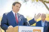  ?? ALAN YOUNGBLOOD/AP ?? Gov. Ron DeSantis speaks to the media as he visited a COVID-19 vaccinatio­n site at On Top of the World in Ocala on March 5.
