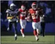  ?? JAE C. HONG — ASSOCIATED PRESS ?? Chiefs running back Kareem Hunt runs 69 yards for a touchdown against the Chargers on Sept. 24.