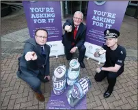  ??  ?? John Lee, Head of Policy and Public Affairs, Scottish Grocers Federation, North Lanarkshir­e Council Leader Jim Logue and Chief Superinten­dent Roddy Irvine launch the campaign