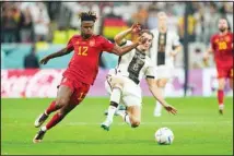  ?? ?? Spain’s Nico Williams (left), challenges for the ball with Germany’s Leon Gorentzka during the World Cup Group E soccer match between Spain and Germany, at the Al Bayt Stadium in Al Khor, Qatar. (AP)