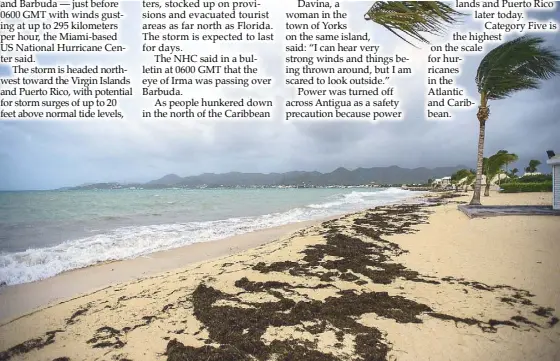  ?? AFP ?? Photo shows a view of the Baie Nettle beach in Marigot yesterday, with the wind blowing ahead of the arrival of Hurricane Irma.