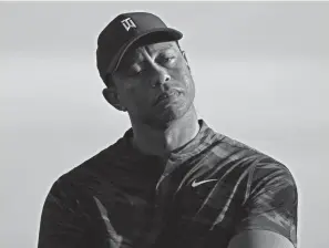  ?? FERNANDO LLANO/AP ?? Tiger Woods gestures during the trophy ceremony of the Hero World Challenge PGA Tour at the Albany Golf Club in New Providence, Bahamas, on Dec. 5.