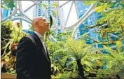  ?? Ted S. Warren Associated Press ?? JEFF BEZOS, touring the Amazon Spheres, will award climate grants from his Bezos Earth Fund.