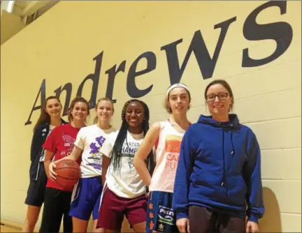  ?? JOHN KAMPF — THE NEWS-HERALD ?? The Andrews Osborne girls basketball team, under first-year coach Brittany Zele, right, is 16-2 heading into the conference tournament this weekend. Members of her team’s starting unit are, from left, Nika Humeniuk, Gabby Culotta, Natalie Thoss, Ari...