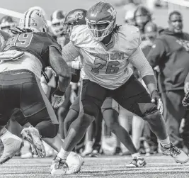  ?? VASHA HUNT USA TODAY Sports ?? Offensive lineman Patrick Paul, seen at Senior Bowl practice Feb. 1 in Mobile, was a four-year stater at the University of Houston. He is 6-foot-7 and 331 pounds.