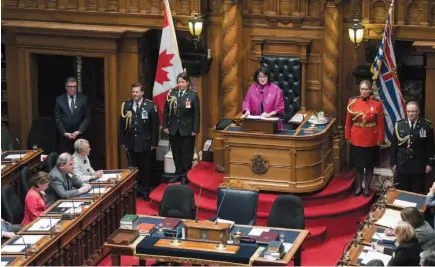  ?? CP PHOTO ?? B.C. Lieutenant Governor Janet Austin delivers the Speech from the Throne in the B.C. Legislatur­e on Tuesday.