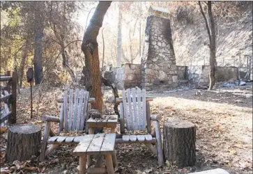  ?? Nick Agro For The Times ?? CHAIRS SIT unscathed by the Bobcat fire, which destroyed 16 cabins in Big Santa Anita Canyon. More than 200 cabins were originally built between 1906 and 1936, but many of them were lost over time.