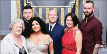  ??  ?? Jade and Anthony McCann (centre) with their family and Jade’s boyfriend: (from left) Joan McCann, Bren Anderson, Jade, Anthony, Kim and Eoin McCann